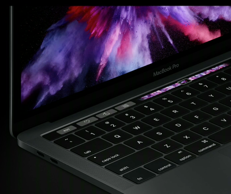 Illustration for article titled El nuevo MacBook Pro tiene una pantalla en el teclado que cambia según lo que necesites